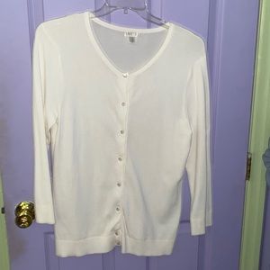 White cardigan sweater.